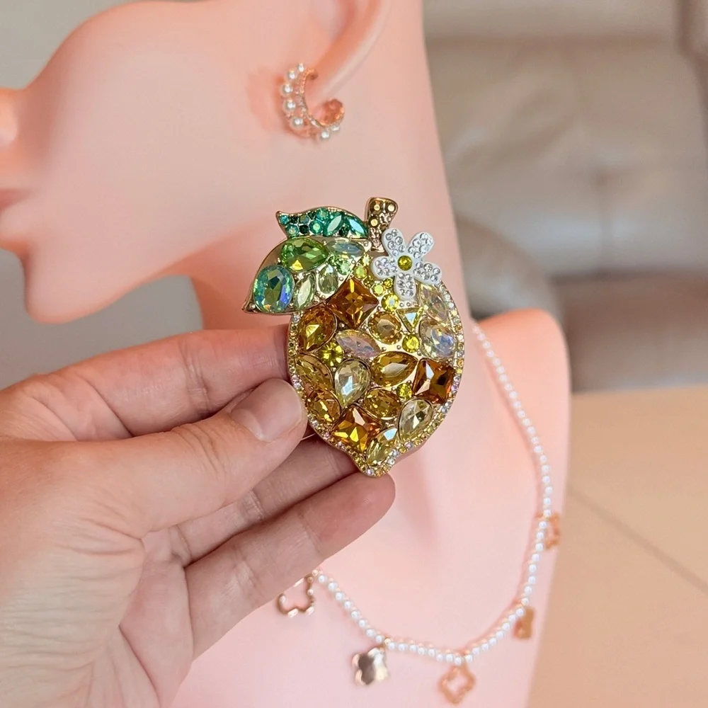 Elegant Gold and Green Crystal Brooch